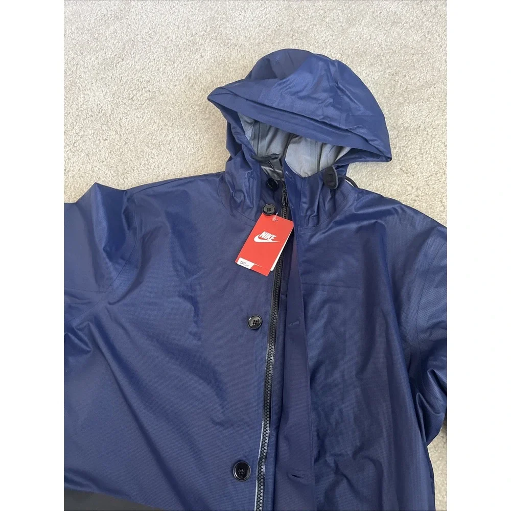 Nike GF New Master Saturday Jacket Black Hyper Blue Water Resistant Nylon Mens